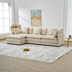110.2 Canapé trois places capitonné en chenille, pouf