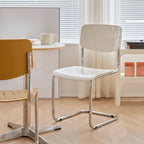 Chaise de salle à manger sans accoudoirs en métal simple, dossier plein jaune