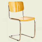 Chaise de salle à manger sans accoudoirs en métal simple, dossier plein jaune
