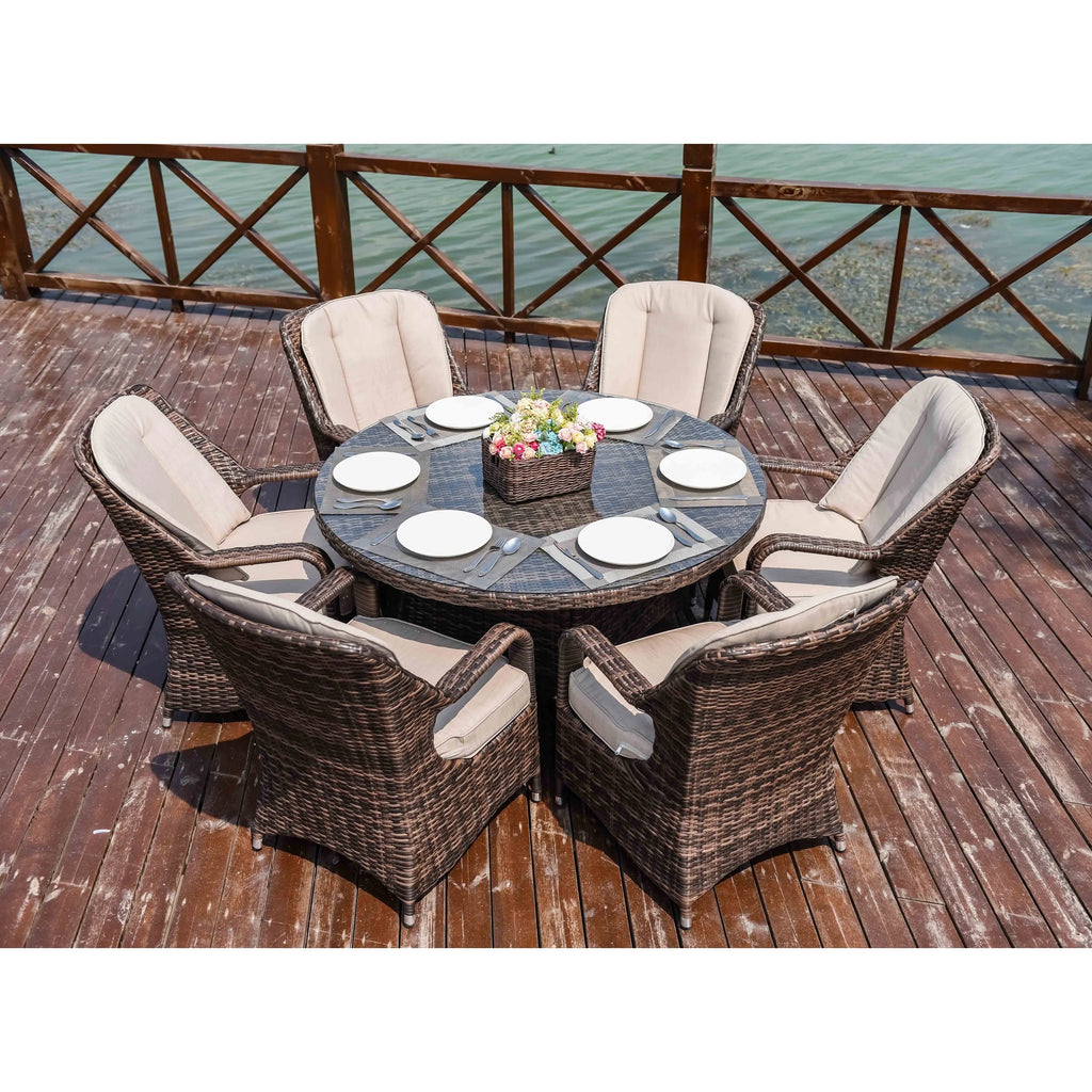 Ensemble de salle à manger rond 7 pièces en rotin tressé d'extérieur avec coussins de Moda Furnishings