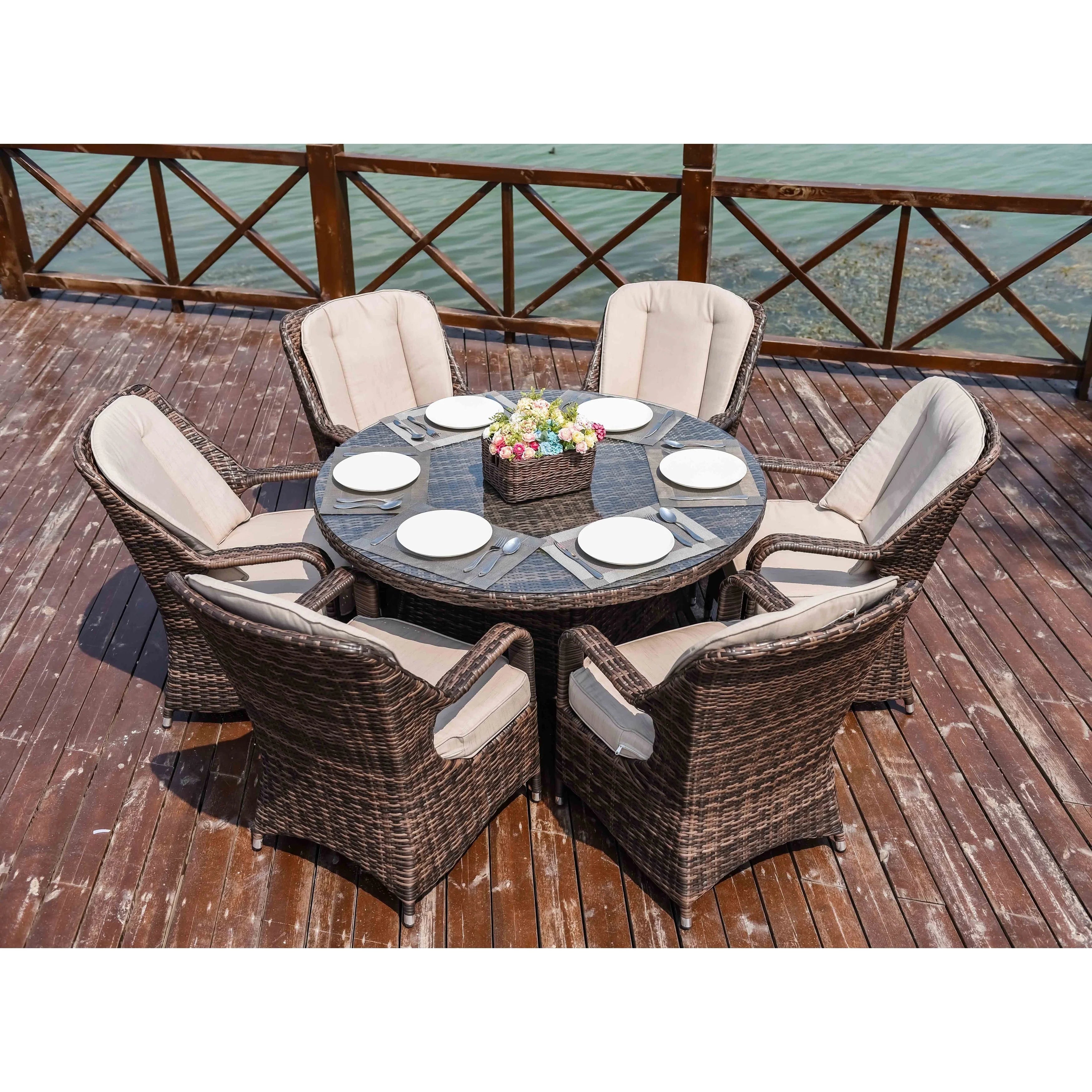 Ensemble de salle à manger rond 7 pièces en rotin tressé d'extérieur avec coussins de Moda Furnishings