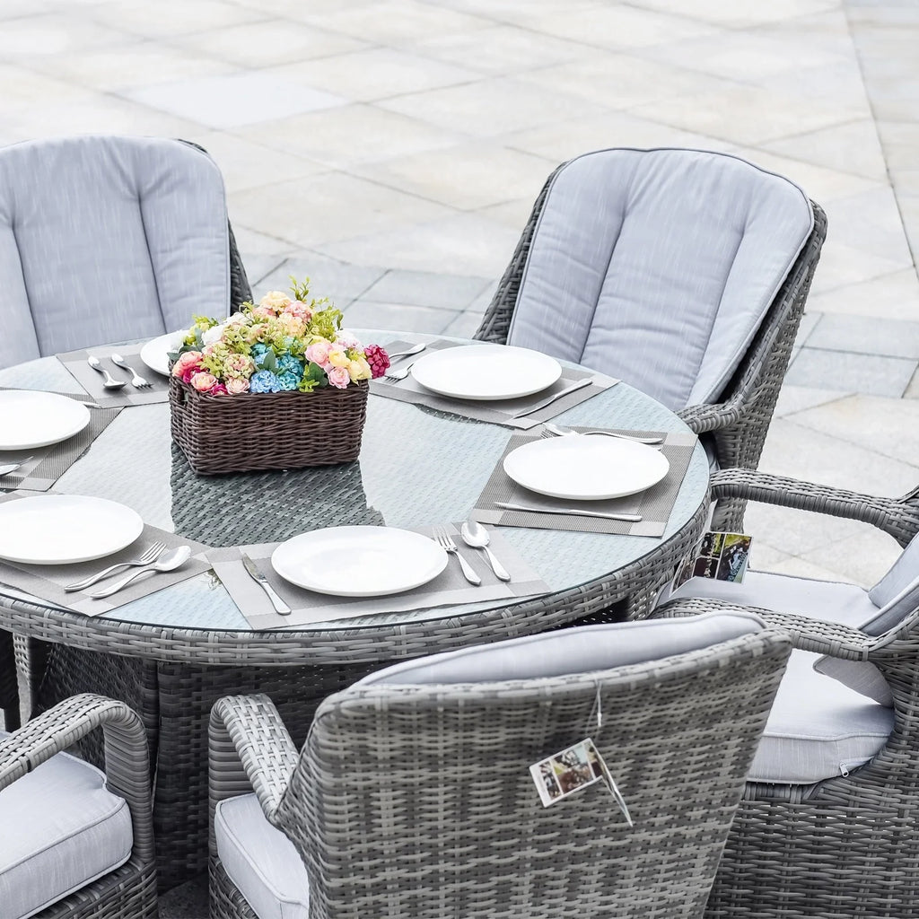 Ensemble de salle à manger rond 7 pièces en rotin tressé d'extérieur avec coussins de Moda Furnishings