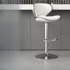 Tabouret de bar réglable pivotant en cuir rembourré