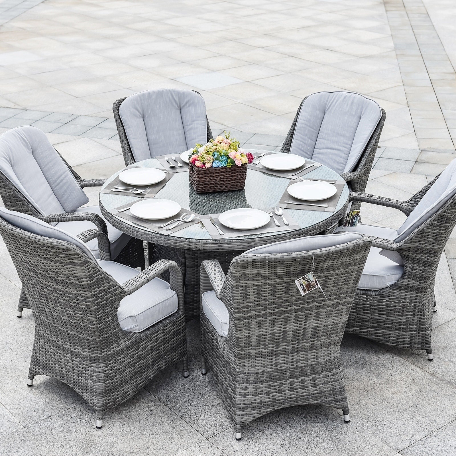 Ensemble de salle à manger rond 7 pièces en rotin tressé d'extérieur avec coussins de Moda Furnishings