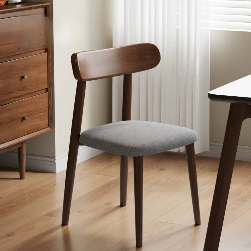 Chaise de salle à manger moderne en cuir sans accoudoirs avec dossier bas