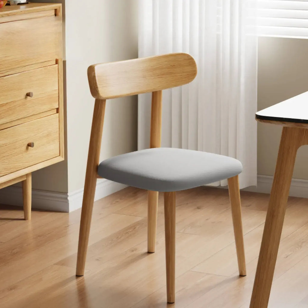 Chaise de salle à manger moderne en cuir sans accoudoirs avec dossier bas