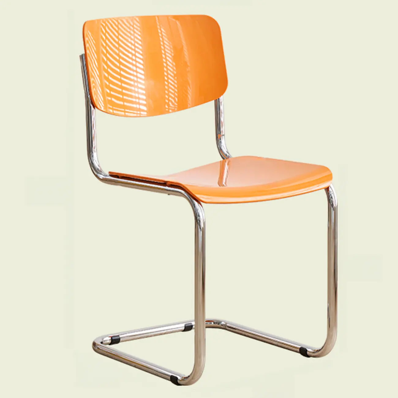 Chaise de salle à manger sans accoudoirs en métal simple, dossier plein jaune
