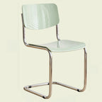 Chaise de salle à manger sans accoudoirs en métal simple, dossier plein jaune